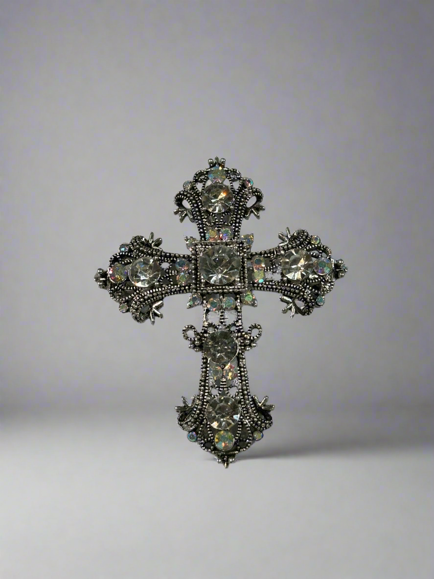Silver cross pin