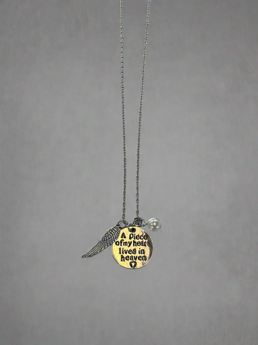 Silver “ Apiece of my heart lives in heaven” necklace