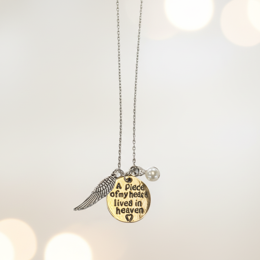 Necklace: Silver “Apiece of my heart lives in heaven”