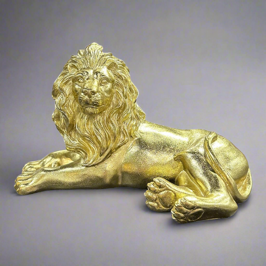 Gold lion laying down