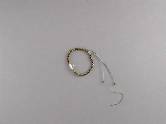 Gold Beaded Cross Tie Bracelet