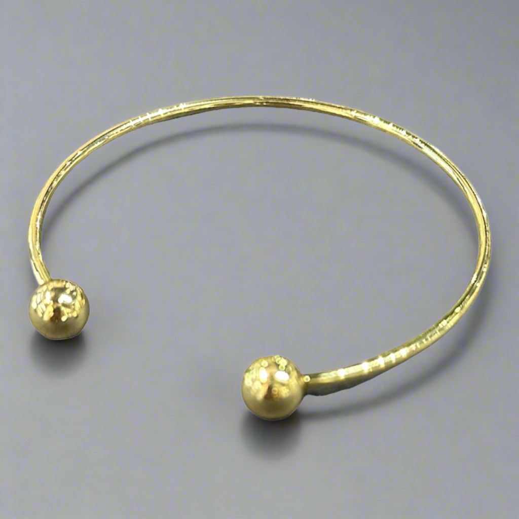 Gold open bangle
