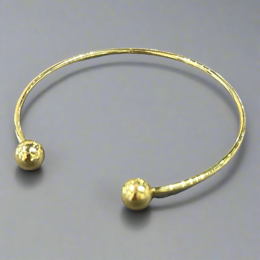 Gold open bangle