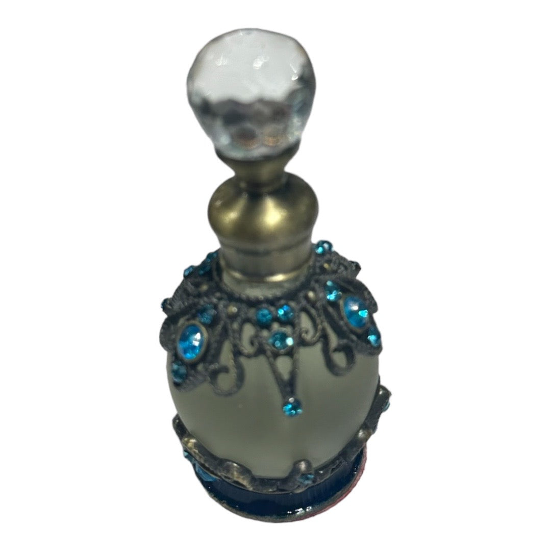 Rapha Jeweled healing oil bottles