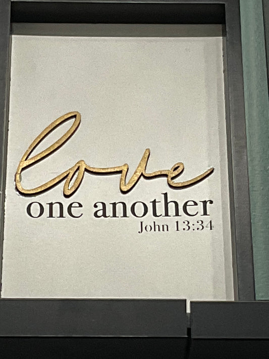 “Love one another” wall decor